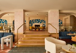 blue mural in back wall of Kimpton Los Monteroa bar with design by El Equipo Creativo