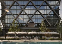 view of façade of Forth Atlanta across swimming pool