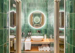 green tiled bathroom in the Kimpton BEM Budapest