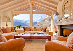 luxury chalet or luxury hotel with large window and mountain view