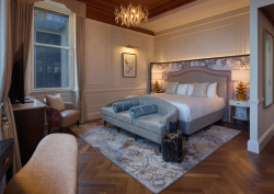 Luxury hotel bedroom at the Caledonian Edinburgh with tufted chandelier by Northern Lights