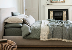Halstock bed from Naturalmat covered in new upholstery fabric ReNew in oat colour.