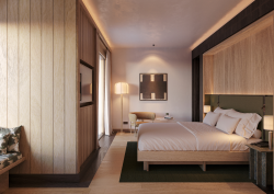 Pine wood panelled bedroom in Aethos mountain chalet
