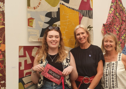 Skopos personnel with Robyn Jones, textile designer and winner of New Designs 2024 award