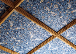 Morris & Co Strawberry thief wallpaper in blue