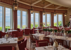 Restaurant area in burgundy colour at Sanderson Resort