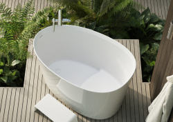 The Kerid bath in outdoor setting, on wooden platform