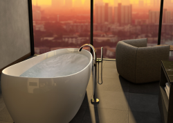 Bathroom by TOTO, with floatation tub overlooking cityscape through floor to ceiling glass window