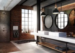 industrial style bathroom with open shower, exposed brick and art above the vanity , with fittings from GRAFF