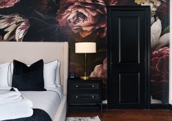 dark oversized floral wallpaper in Garden-Gables_Guest-Rooms_