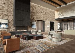 render of Grand Hyatt Deer Valley lobby with chairs surrounding fireplace