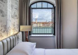 view across the canal to Venice from guestroom in Hilton Molino Stucky Venice
