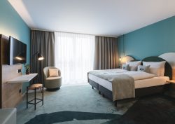 guestroom in the niu - the first holiday inn to open in germany