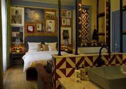 eclectic and layered guestroom design at 25hours hotel in Copenhagen