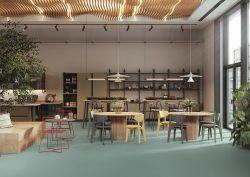 cafe with wooden furniture and ceiling and olive green safetred flooring from Tarkett