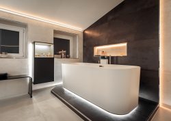 bathroom with built in architectural lighting system from Schluter