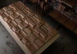 Workshop view of 10-metre cherry wood tile installation