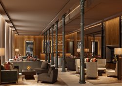seating areas in the lobby of JW Marriott Madrid separated by a row of columns