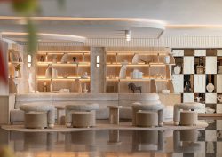 round tub seating in front of shelving display in wood and white in hotel lobby Sofitel Los Angeles at Beverly Hills