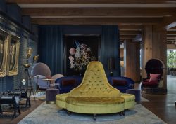 yellow couch in lobby at Pulitzer amsterdam