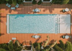 aerial view of pool and chairs at Maison Felix