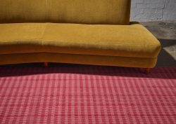 mustard sofa on red Modieus carpet