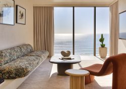curved chair and sofa with seaview in guestroom Mondrian Gold Coast