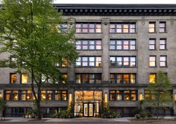 exterior facade of Populus Seattle, a carbon positive hotel in Seattle’s historic Pioneer Square
