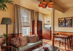 couch, lamp and home-style furniture in Portobello Lodgings