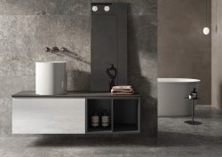 bathroom with marble tiled walls and wall hung furniture and fittings from the RAK petit range