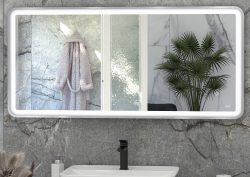 rectangular bathroom mirror from RAk above basin reflecting bathrobe and indoor plant