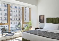 view from bed in aparthotel ROOST Washington DC with city view