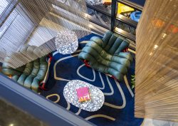aerial view of reception and lobby with pattern carpet in TRIBE Den Haag