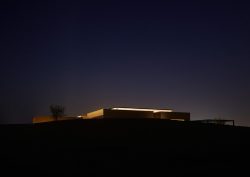 Distant shot of H+A architecture studio's Ritz Carlton desert villa - taken at night