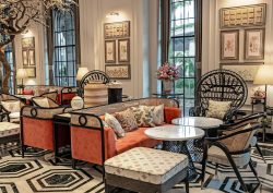 orange couch and patterned floor in Fairmont Mumbai