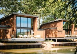 ‘The Reeds’ lakeside lodges set within the 93-acre estate grounds of South Lodge