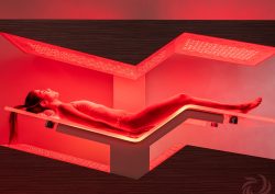 wellness trends - woman lying on Ammortal infra red bed