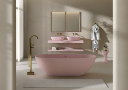 pink freestanding bath and basin with brass fittings in cream bathroom room set