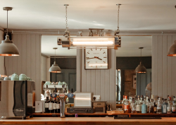 vintage lighting from Loomlight over retro bar and coffee station photo credit @suiehuntinglodge