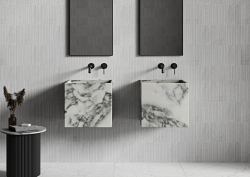 double wall-hung marble basins from Nôsa in the OpusArtis™ Marble Collection