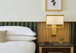 bed and headboard detail in guestroom Kimpton Ashbel New York-Park Avenue