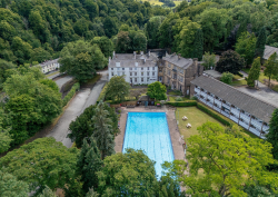 aerial view of grounds , pool and hotel - A new addition to the Radisson Individuals portfolio, the New Bath Hotel & Spa,is a historic spa retreat located on the edge of the Peak District National Park