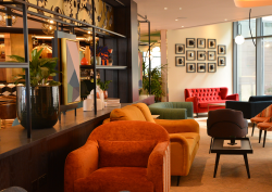 lobby area of Hotel Indigo with wallcoverings by Newmor