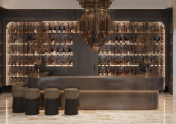 copper, brown and cream hotel lobby with statement contemporary chandelier above desk in Park Lane Copenhagen