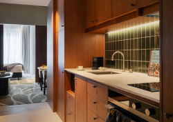view from kitchen into guestroom at Adina Hobart