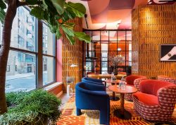 plants, tiled walls and colourful seating in Wilde Liverpool street