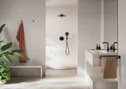 cream and white bathroom with plants showcasing Grohe Rapido Heat Recovery Shower System