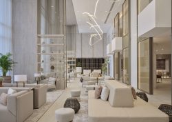 white and cream lobby and seating area in ihg arabella beach resort