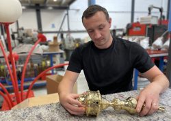 Michael Mulhall from Dernier & Hamlyn working on a light fitting in the workshop