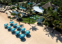 Missoni and Ritz Carlton Beach pop up collaboration with missoni parasols on the beach